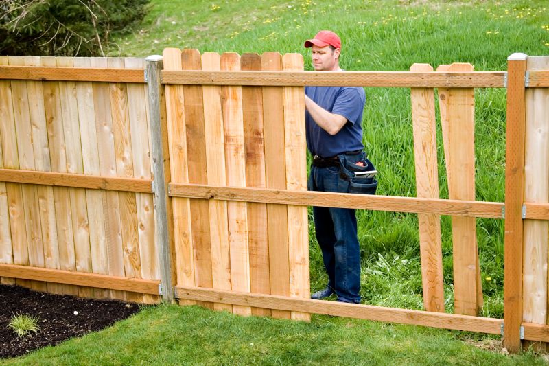 Fence professionals at work